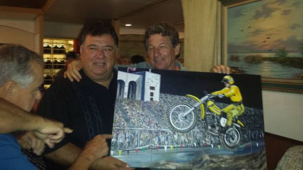 Marty receives the painting from Jim Beauchamp.