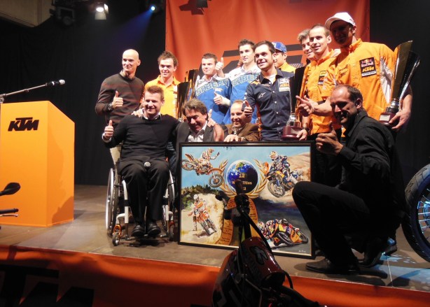 KTM riders celebrate 12 World titles with CEO Stefan Pierer at the factory.